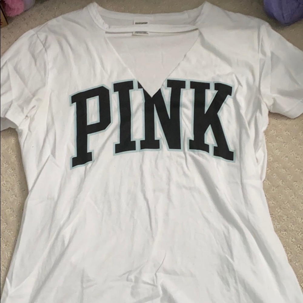 PINK shirt with neck cutout. Worn a few times